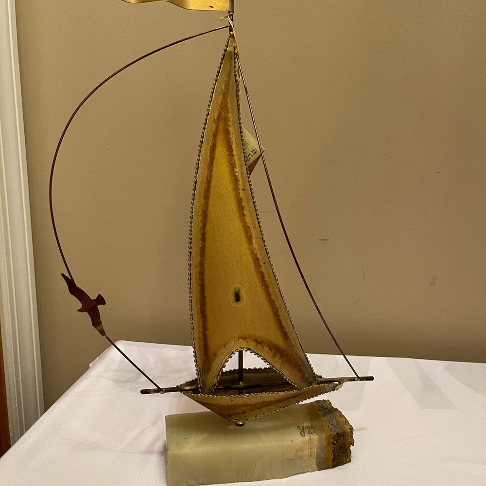 Vintage YOSI Mid Century Modern Brass SAILBOAT Sculpture on the marble. Signed